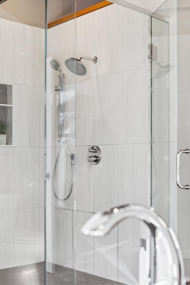 bathroom featuring walk in shower