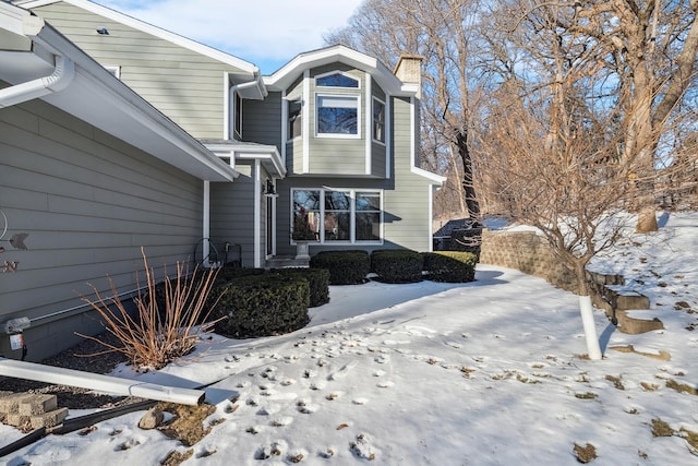 view of snow covered property