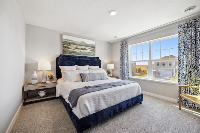 bedroom featuring carpet