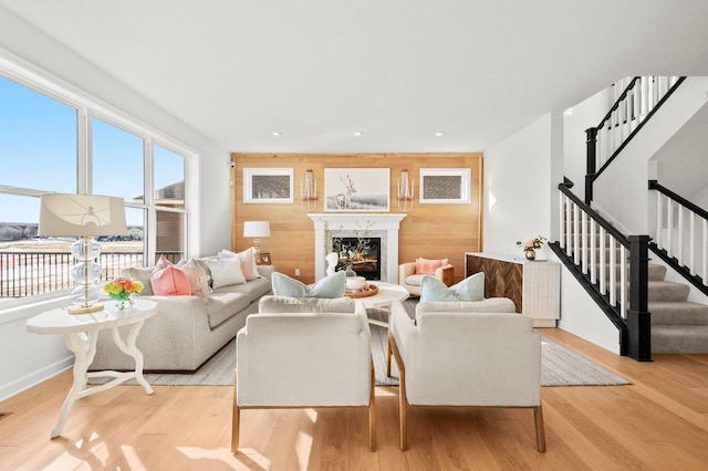 living room with light hardwood / wood-style flooring