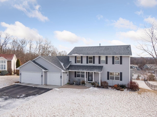 view of front of home with a garage