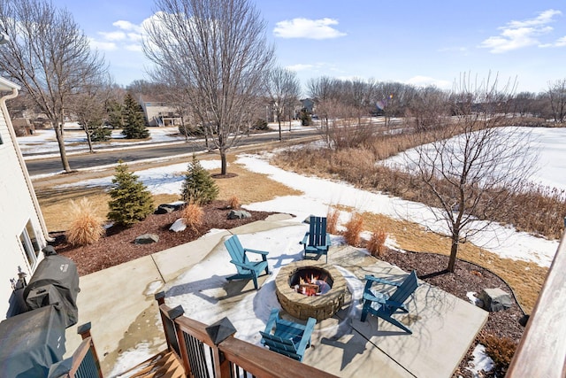 exterior space featuring a fire pit