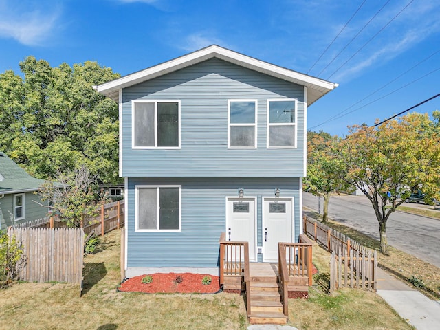 view of front of home with a front yard