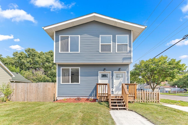 view of front of home featuring a front lawn