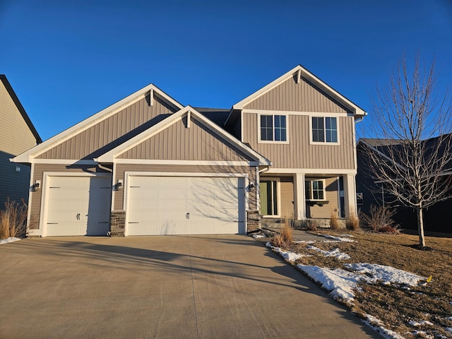 craftsman-style home featuring a garage