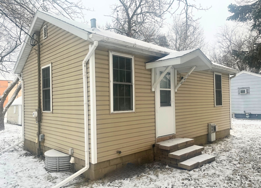 view of snow covered property