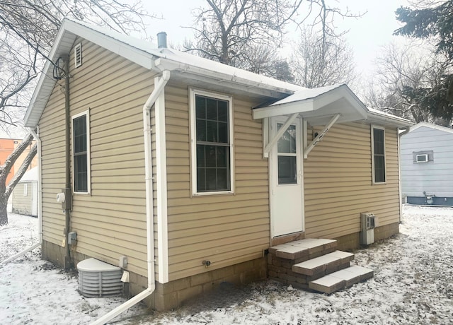 view of snow covered property