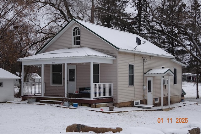 bungalow-style home with a porch