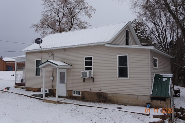 view of front of home featuring cooling unit