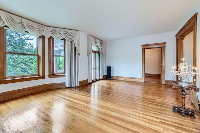 442 Summit Ave Unit 6, Saint Paul, MN 55102 - unfurnished living room with light wood-style flooring and baseboards