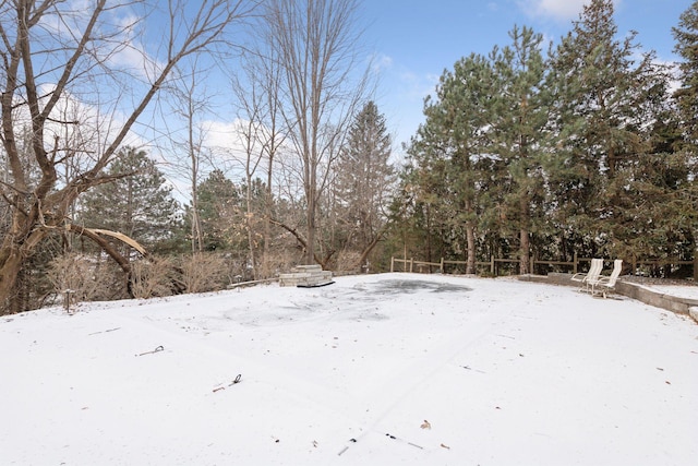 view of snowy yard