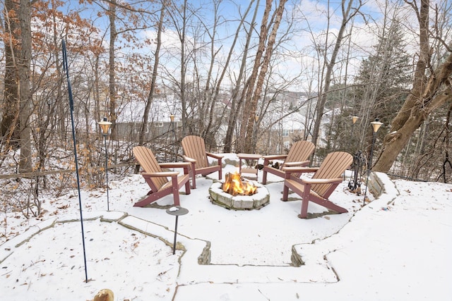 exterior space with a fire pit