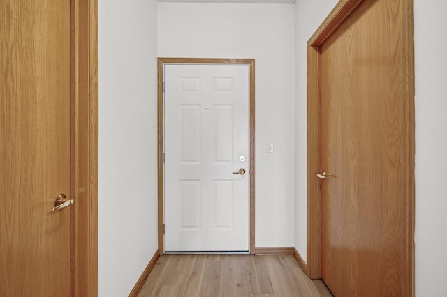 corridor featuring light hardwood / wood-style flooring