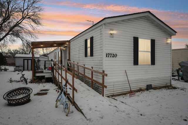 view of snow covered property