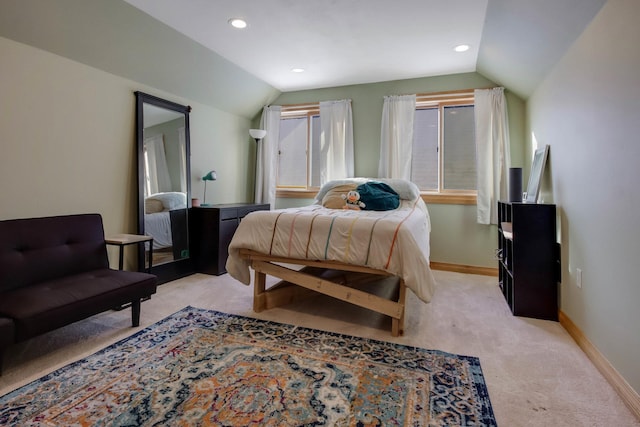 bedroom with vaulted ceiling, recessed lighting, light colored carpet, and baseboards