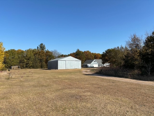 view of yard with a garage