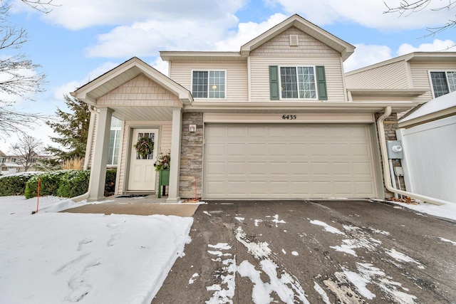 view of front of property with a garage