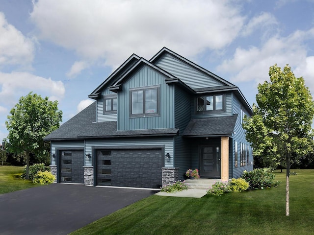 craftsman-style house featuring a front lawn, a garage, driveway, and roof with shingles