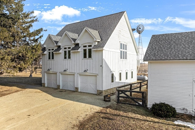 view of property exterior with a garage