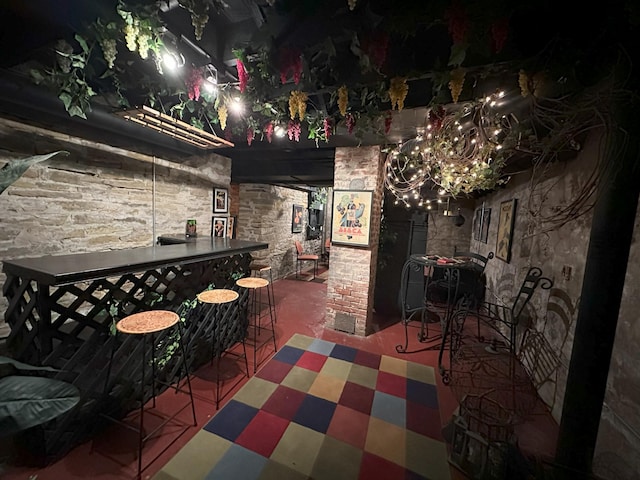 view of patio with an outdoor bar