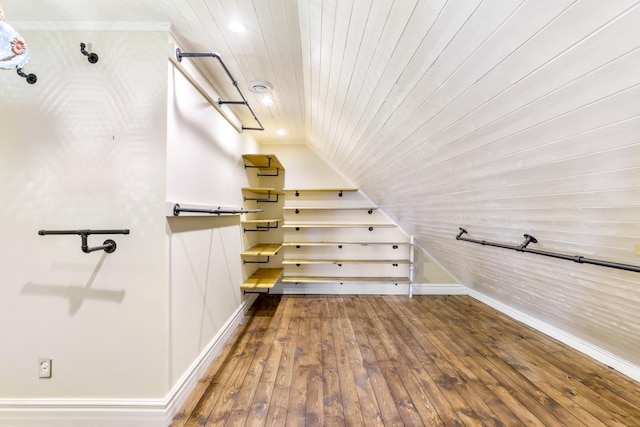 bathroom featuring hardwood / wood-style flooring, vaulted ceiling, and wooden ceiling