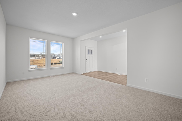 view of carpeted spare room