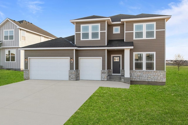 view of front of house with a garage and a front yard