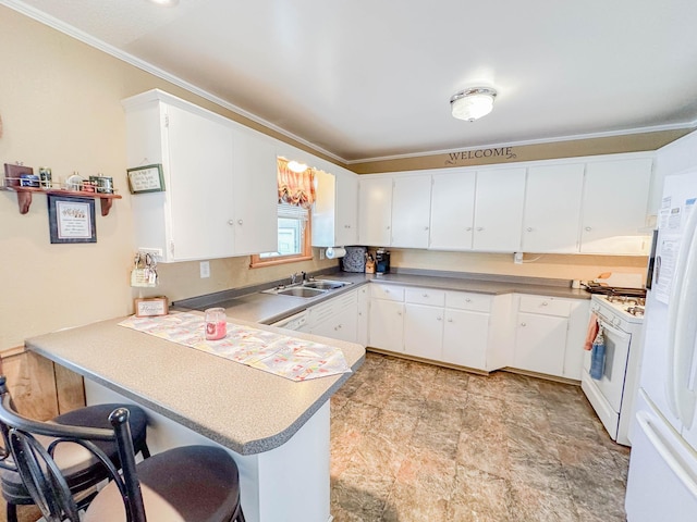 kitchen featuring kitchen peninsula, white appliances, white cabinetry, and a breakfast bar area