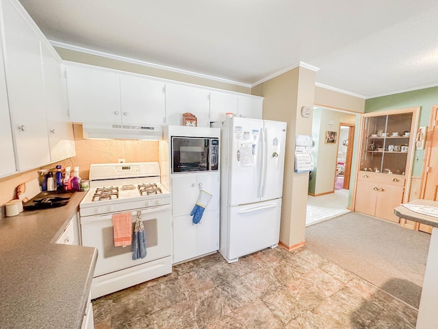 kitchen with white cabinets, white appliances, crown molding, and light carpet