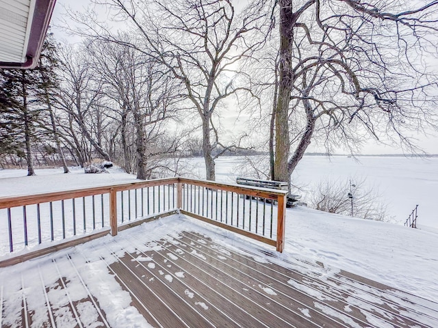 view of snow covered deck