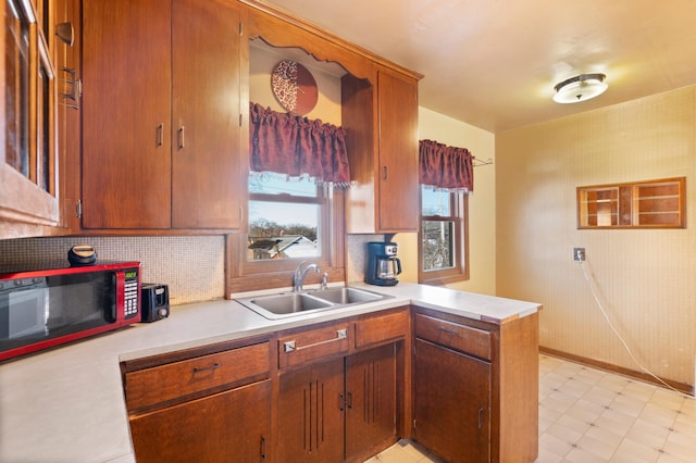 kitchen with sink and kitchen peninsula