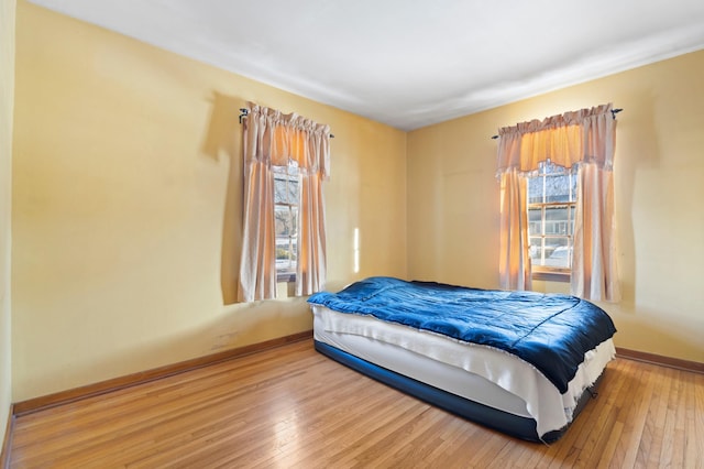 bedroom featuring hardwood / wood-style flooring