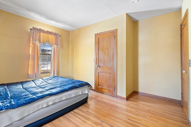 bedroom with light wood-type flooring