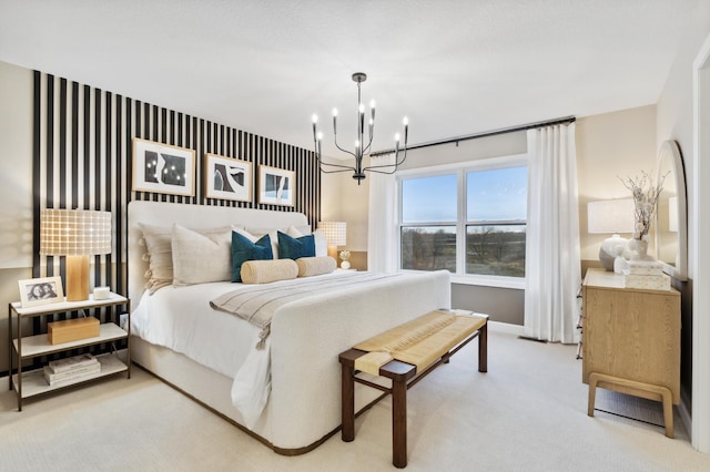 bedroom with light carpet and a chandelier