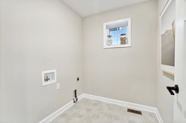 laundry area with washer hookup, hookup for a gas dryer, and electric dryer hookup