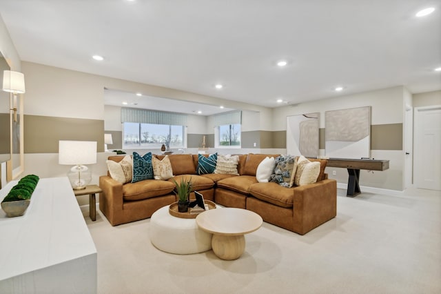 carpeted living room with billiards