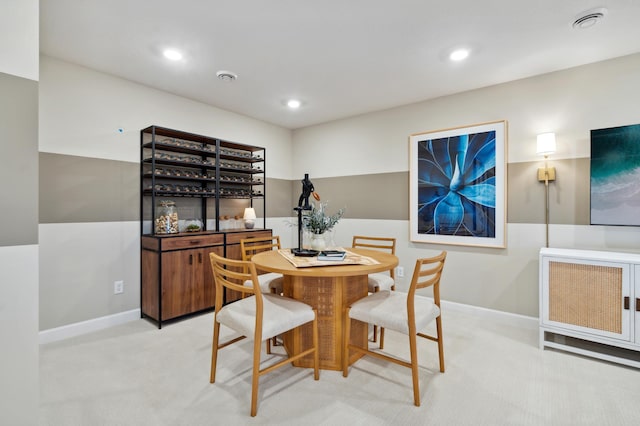 view of carpeted dining space