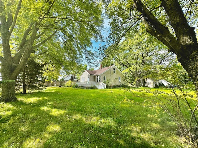 view of yard featuring a deck