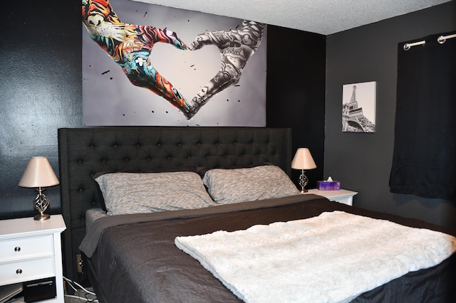 bedroom featuring a textured ceiling