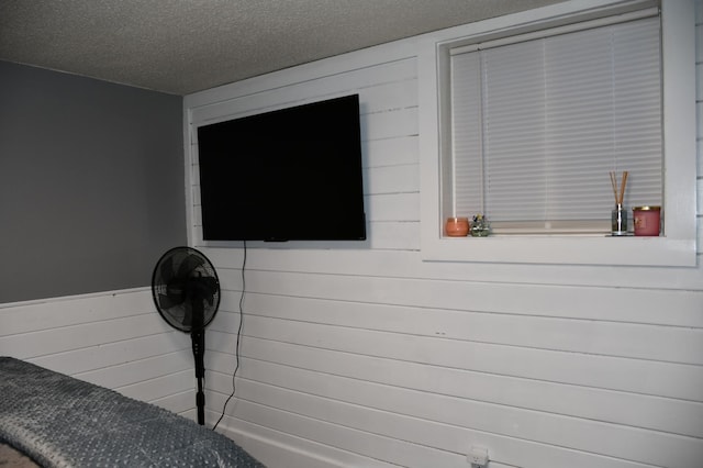 interior details with a textured ceiling