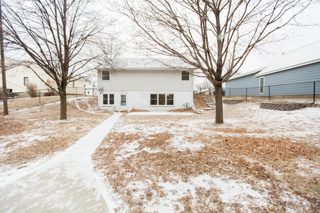 view of snow covered house