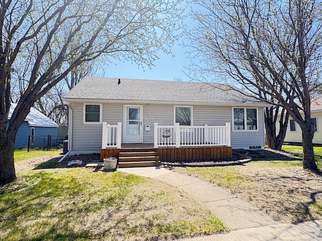 707 Haarfager Ave N, Canby, MN 56220 - view of front facade featuring a front yard and a shingled roof