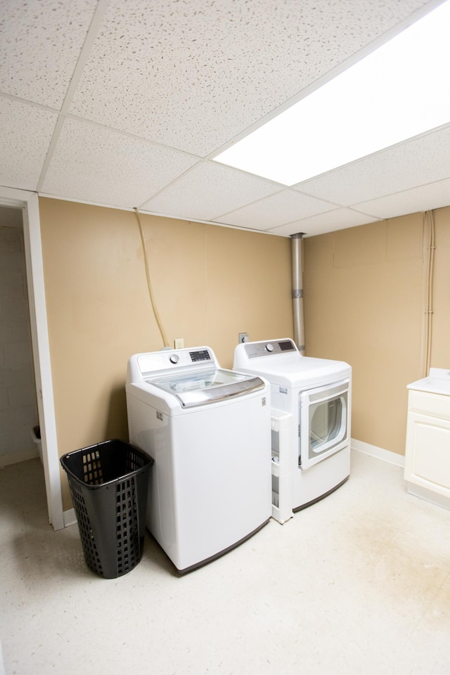 707 Haarfager Ave N, Canby, MN 56220 - washroom featuring separate washer and dryer and baseboards