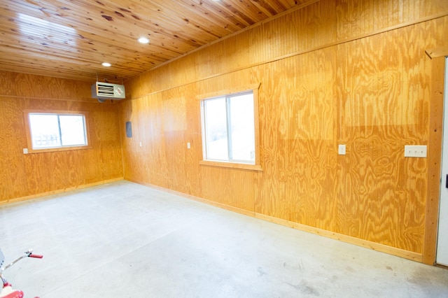 707 Haarfager Ave N, Canby, MN 56220 - unfurnished room with wood ceiling, concrete floors, wooden walls, and recessed lighting