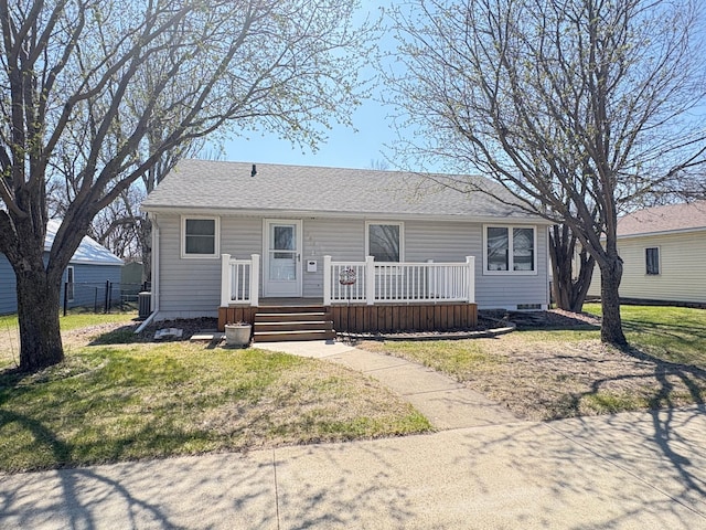 707 Haarfager Ave N, Canby, MN 56220 - view of front facade with central AC unit and roof with shingles