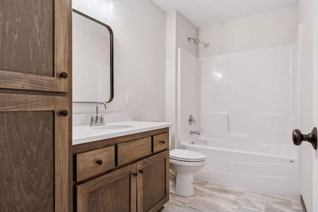 full bathroom featuring bathing tub / shower combination, vanity, and toilet