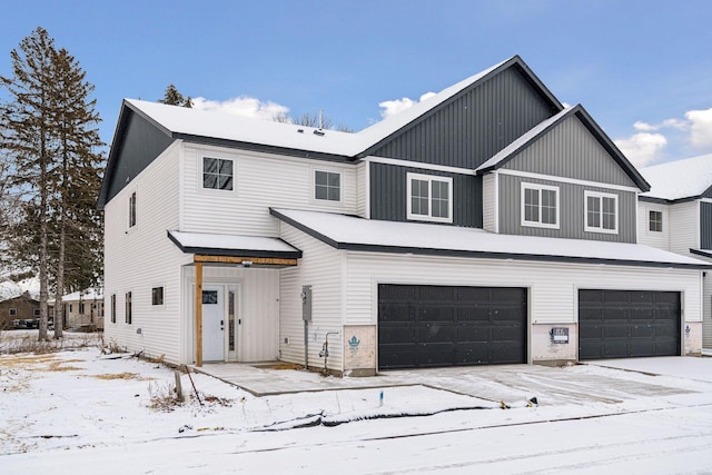 view of front of home with a garage