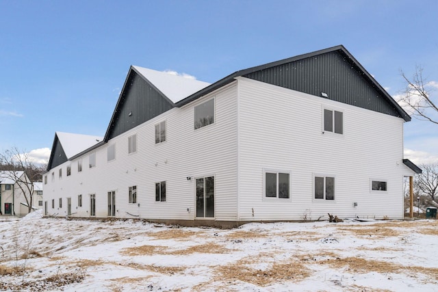 view of snow covered property