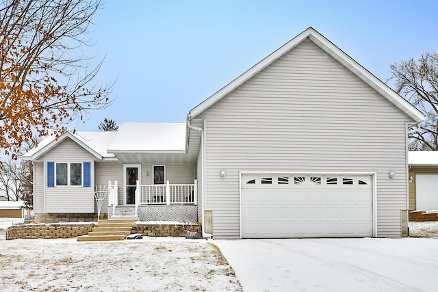 view of front of house with covered porch and a garage