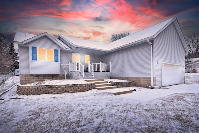 view of front of home with a garage